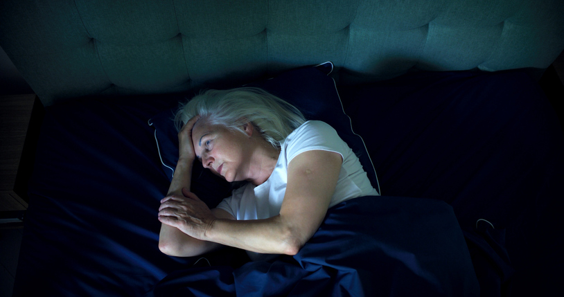 A woman who knows firsthand all about restless nights in older adults stares into space as she tries to fall asleep.